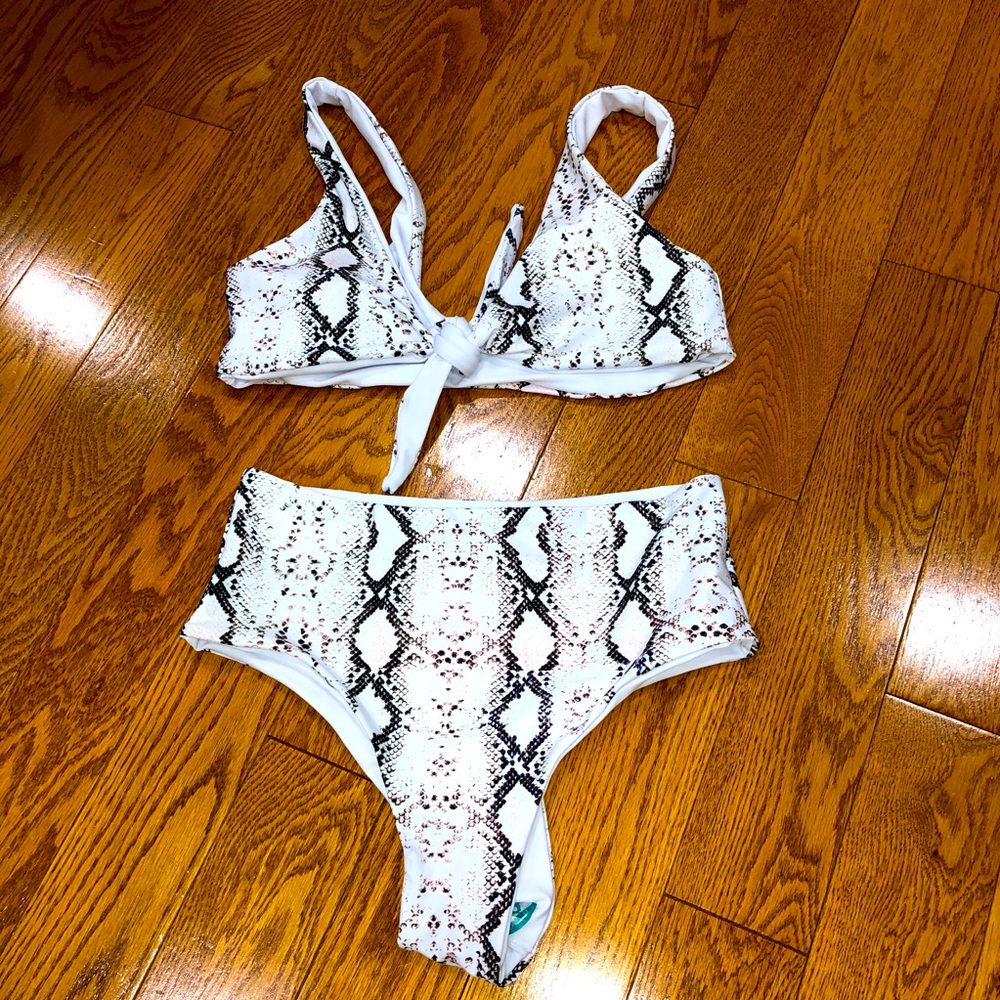 Snake patterned bathing suit.